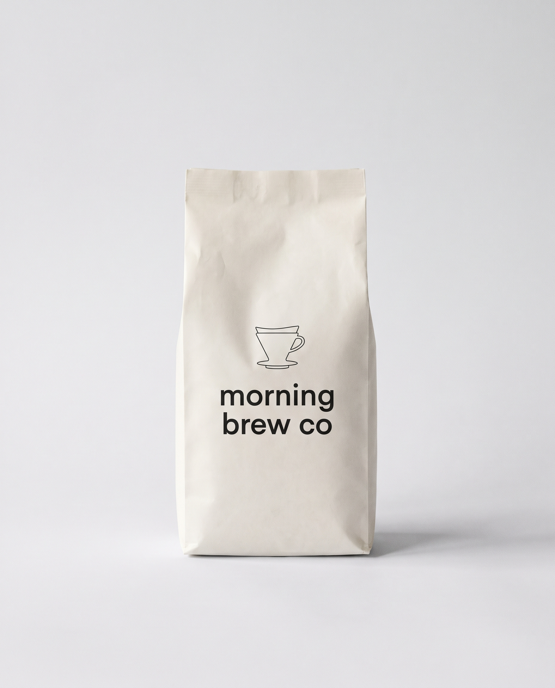 A cream 12 ounce bag of Morning Brew Co House Blend whole bean coffee